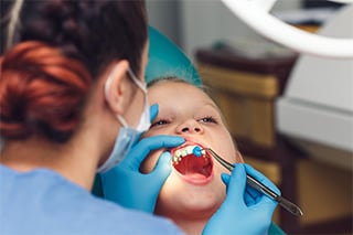 Child in dentist chair