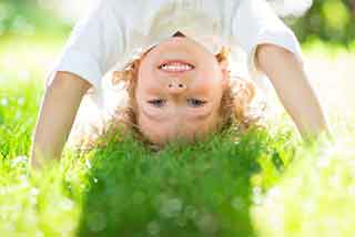 Child doing a headstand